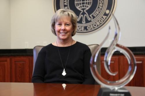 Accreditation group honors finance officer